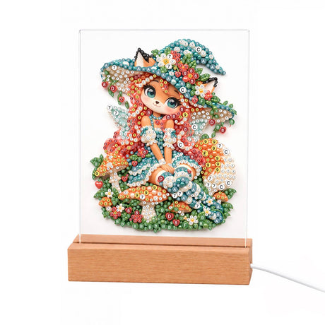 Red-Haired Fox Girl and Toadstools light-up pearl painting – Fox-eared girl with red hair in a teal witch hat and dress sitting on spotted mushrooms