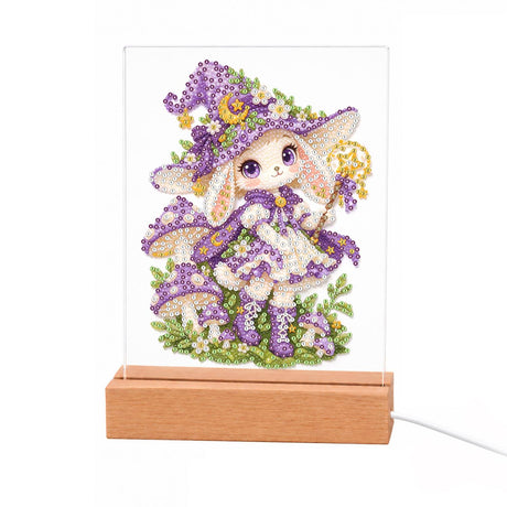 Bunny Witch with a Star Wand light-up pearl painting – Bunny-eared girl in a purple witch hat and dress holding a star wand among purple mushrooms