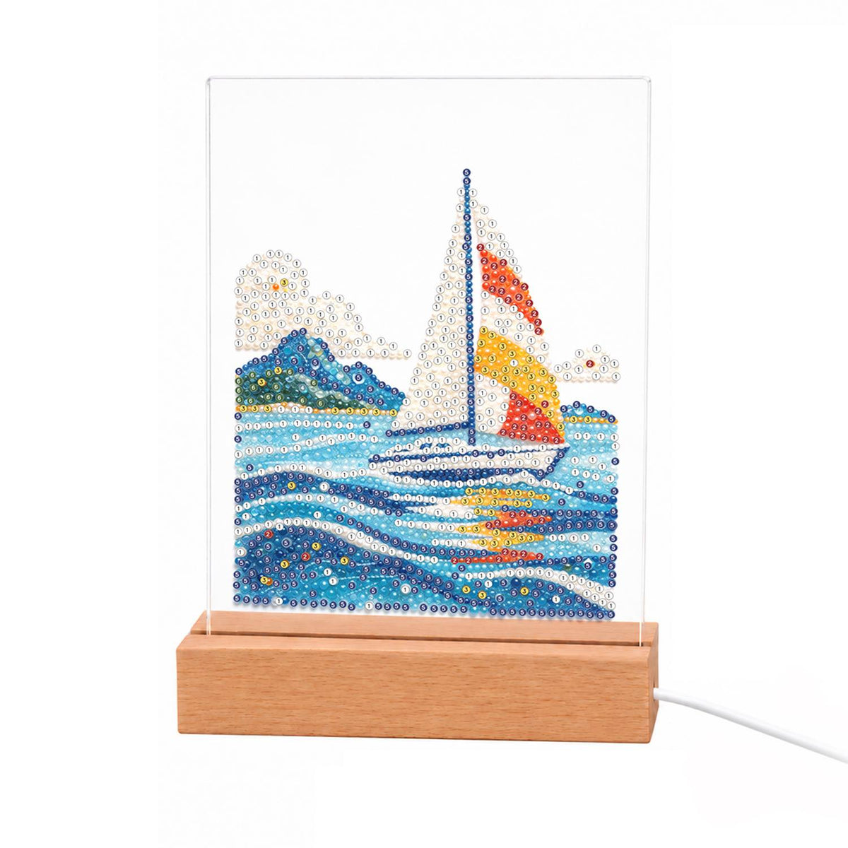 Sailboat on Rolling Blue Waves light-up pearl painting – Small sailboat with white, orange and yellow sails on rolling blue waves near green hills