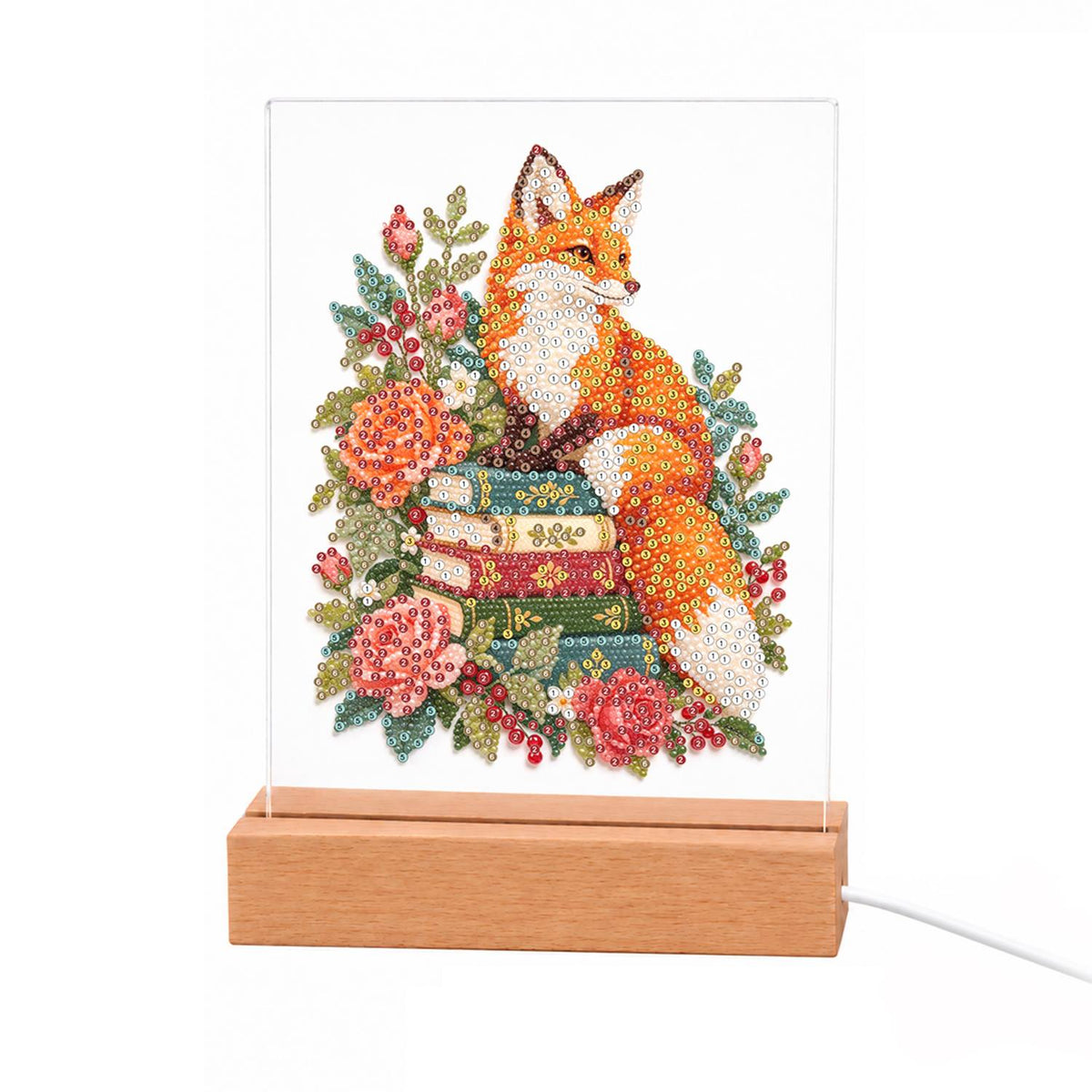 Fox Atop a Stack of Books light-up pearl painting – Orange fox resting on a stack of books surrounded by coral and pink peonies and roses