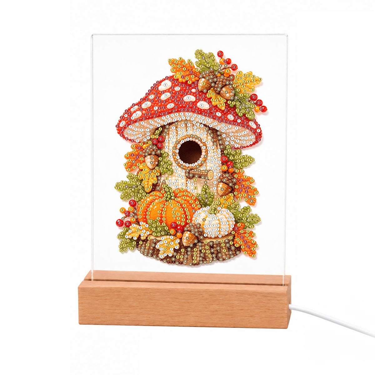 Toadstool Cottage with Pumpkins light-up pearl painting – Red-and-white toadstool house with a round door among pumpkins, berries and orange autumn leaves