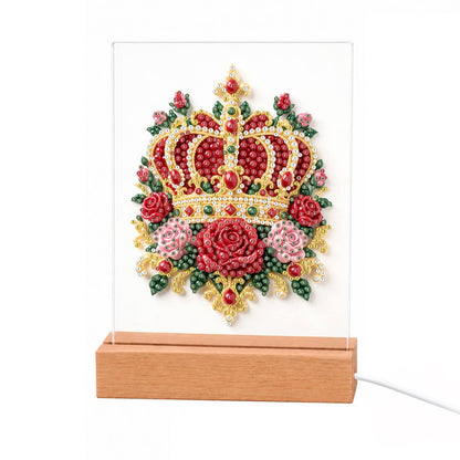 Royal Crown in Red Roses light-up pearl painting – Red and gold jeweled crown resting on red and pink roses with gold filigree and green leaves