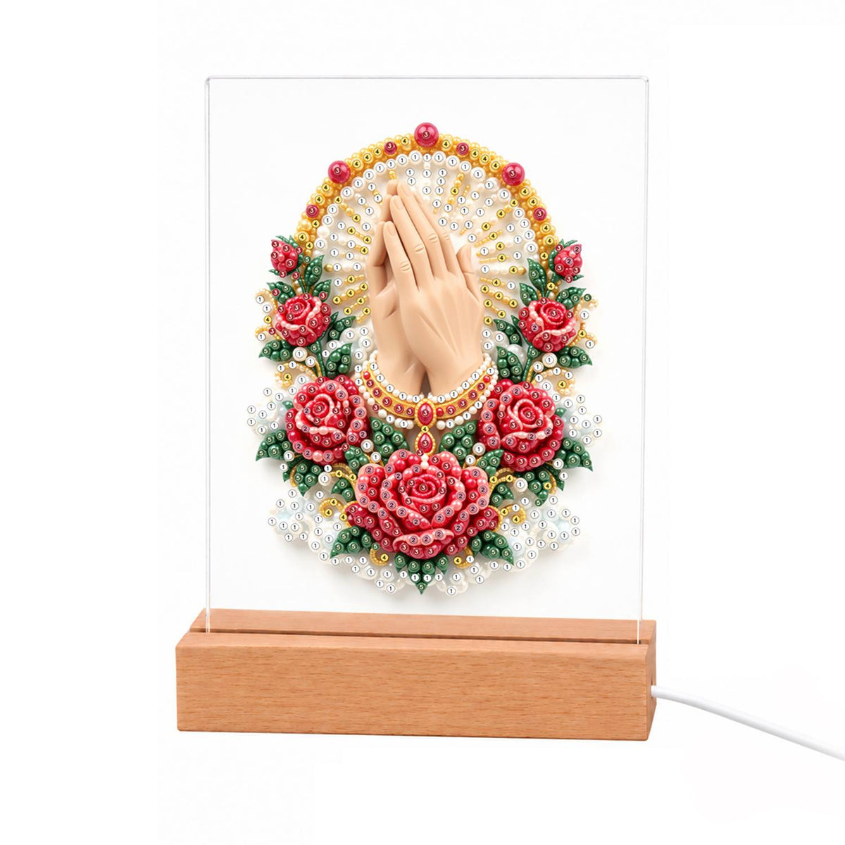 Praying Hands in a Rose Garland light-up pearl painting – Praying hands inside a gold oval halo, framed by red roses, white flowers and green leaves