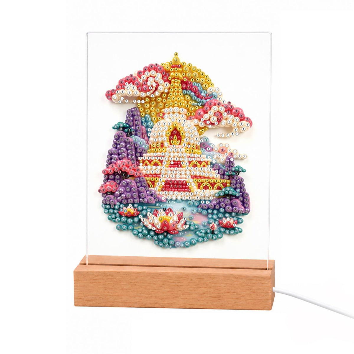 Golden Pagoda Over a Lotus Pool light-up pearl painting – Golden fantasy pagoda on purple rocks among pink clouds, above a teal pool with pink lotus flowers