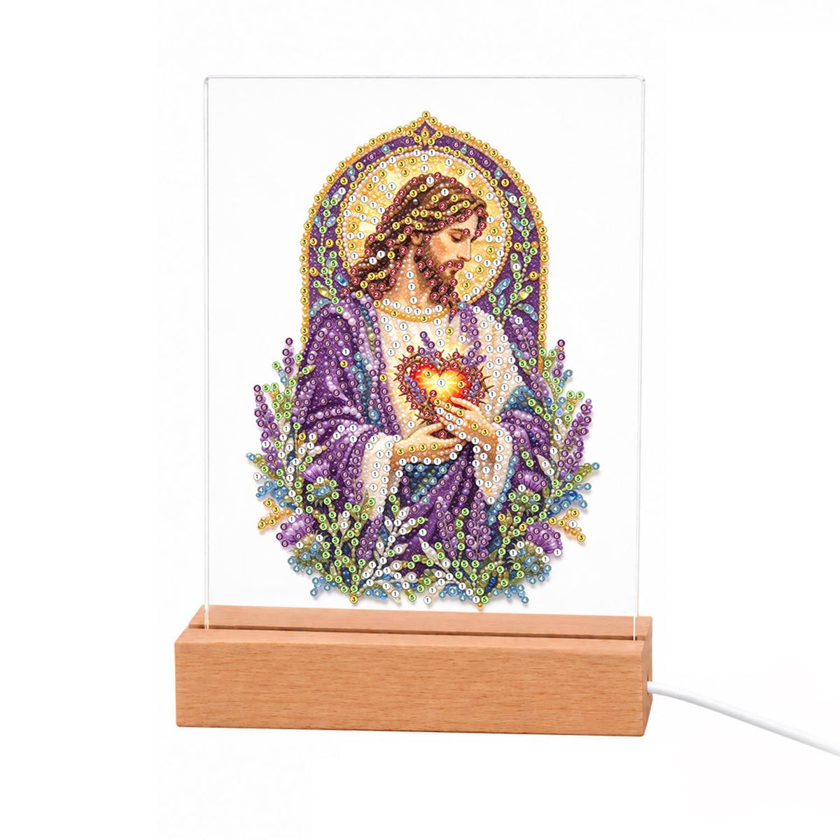 Sacred Heart Amid Lavender light-up pearl painting – Jesus in a purple robe holding his glowing Sacred Heart under a golden halo, framed by lavender sprigs