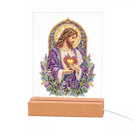 Sacred Heart Amid Lavender light-up pearl painting – Jesus in a purple robe holding his glowing Sacred Heart under a golden halo, framed by lavender sprigs