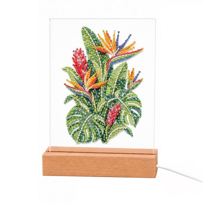 Bird of Paradise and Monstera light-up pearl painting – Orange bird of paradise flowers and red ginger blooms over lush green monstera leaves