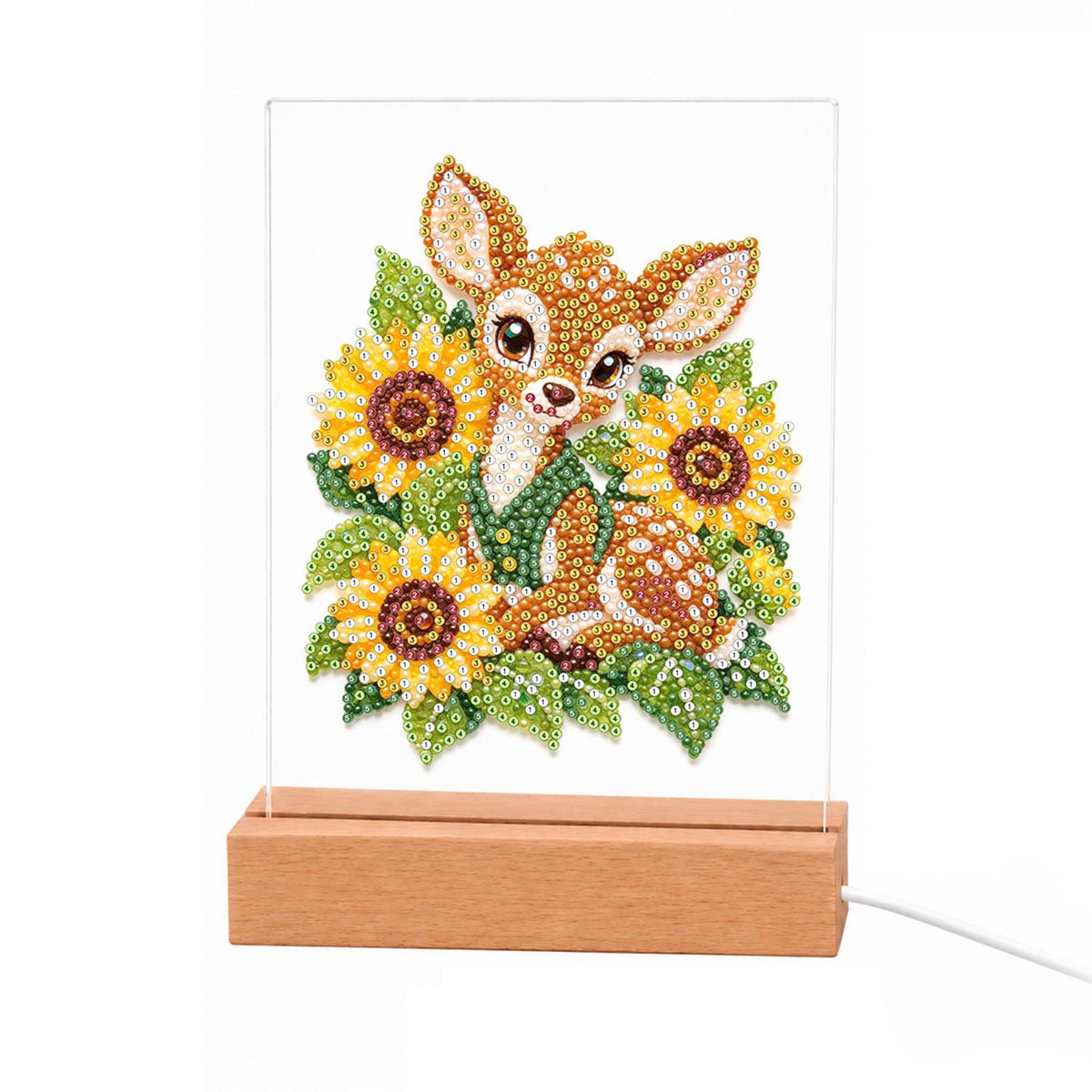 Fawn Nestled in Sunflowers light-up pearl painting – Smiling spotted fawn lying among bright yellow sunflowers and green leaves