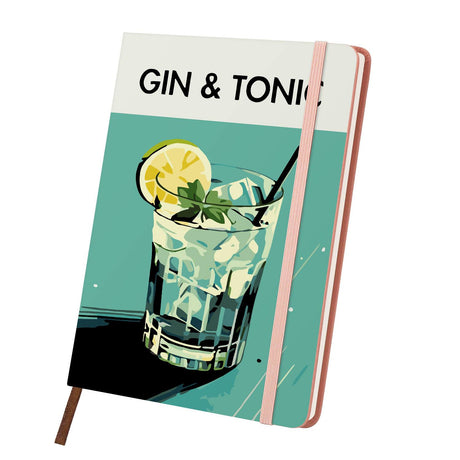 Sparkling Gin Highball on Teal paint by numbers notebook – Iced gin and tonic with a lemon wheel, mint and black straw on teal, pink notebook