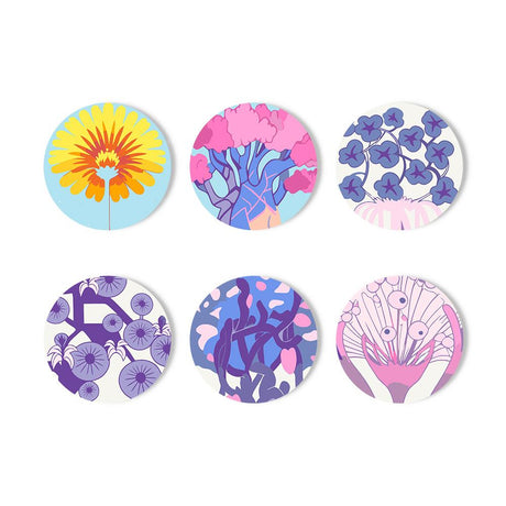 Violets and Blossom Tree paint by numbers coasters – Yellow gerbera on blue, pink blossom tree, scattered violets, purple floral patterns and a pink line-drawn bloom
