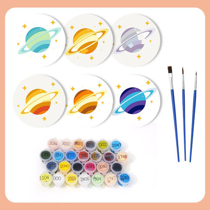 Ringed Planet Parade paint by numbers coasters – what's in the kit: the 6 coasters, numbered paints and brushes