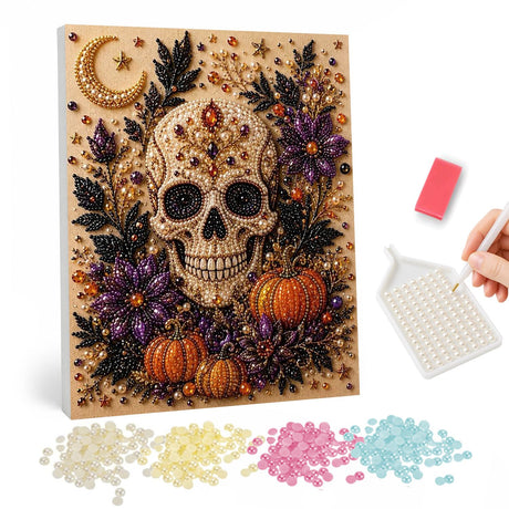 Golden Skull Among Dark Blooms pearl painting – Studded golden skull surrounded by purple flowers, dark leaves and orange pumpkins under a crescent moon