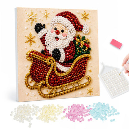 Jolly Santa's Red Sleigh pearl painting – Cartoon Santa waving from a red sleigh with gold runners piled with gifts, on cream with gold stars