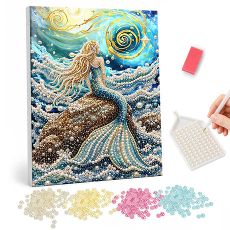 Mermaid Under a Swirling Sky pearl painting – Blonde mermaid sitting on a rock among foaming waves beneath a swirling golden moonlit sky