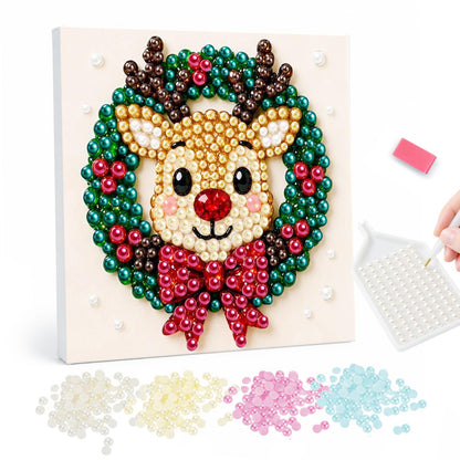 Reindeer Face in a Bowed Wreath pearl painting – Cartoon reindeer face framed by a green wreath with red berries and a big red bow
