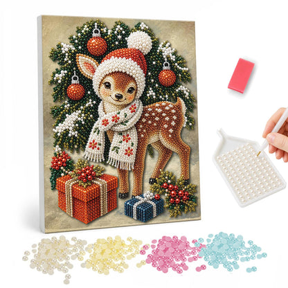 Snowflake-Scarf Fawn pearl painting – Spotted fawn in a Santa hat and snowflake scarf with wrapped gifts and a wreath of baubles