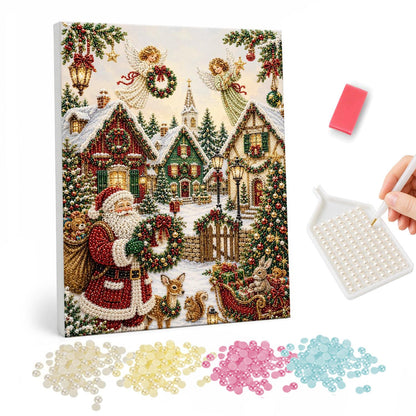 Wreath-Bearing Village Santa pearl painting – Santa holding a wreath in a snowy village with fawns and a sleigh, angels flying overhead