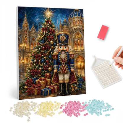 Blue-Coat Nutcracker at the Palace pearl painting – Nutcracker in a blue uniform beside a tall Christmas tree and gifts in a grand palace square at night