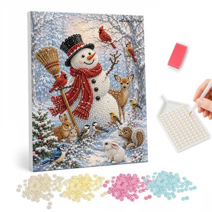 Broom-Holding Snowman and Friends pearl painting – Snowman in a top hat and red scarf holding a broom, with deer, cardinals, rabbits and a squirrel in snowy woods