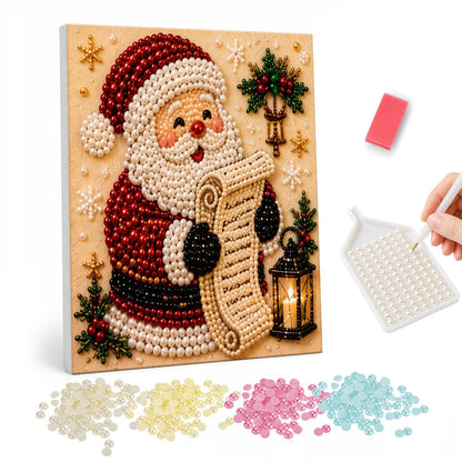 Santa's List by Lantern Light pearl painting – Santa reading a long scroll beside a glowing lantern, with holly and snowflakes on a tan background