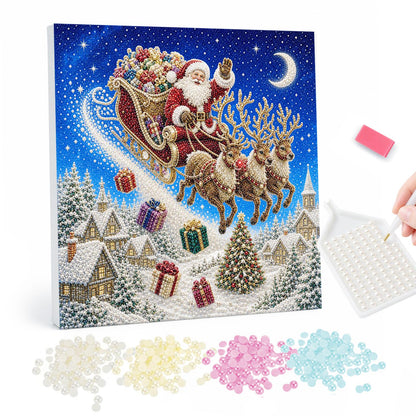 Crescent Moon Sleigh Flight pearl painting – Santa's sleigh and reindeer sweeping on a trail of sparkle over a snowy village under a crescent moon