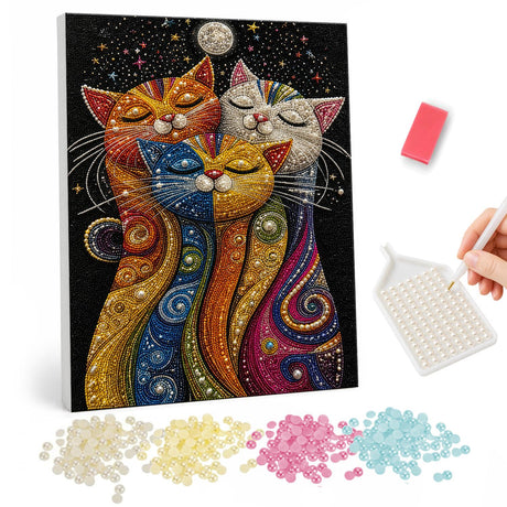 Cuddling Rainbow Cats Under Moon pearl painting – Whimsical cats with swirling rainbow-patterned bodies cuddling under a full moon on a starry black sky