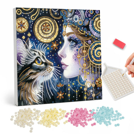 Celestial Woman and Tabby Cat pearl painting – Pale woman's face in a jeweled headdress facing a tabby cat amid gold swirls and a starry sky