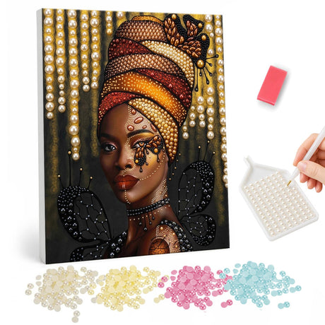 Butterfly-Kissed Woman in Turban pearl painting – Woman in an orange and brown striped head wrap with butterfly accents on her face and hanging gold beads