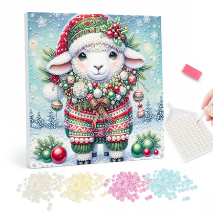 Lamb in a Festive Sweater pearl painting – Smiling lamb in a Santa hat and red-green knit sweater wearing a garland, standing in snow with ornaments