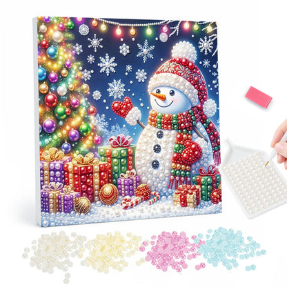 Snowman Holding a Red Heart pearl painting – Snowman in a red hat and scarf holding a red heart beside a lit Christmas tree and wrapped gifts at night
