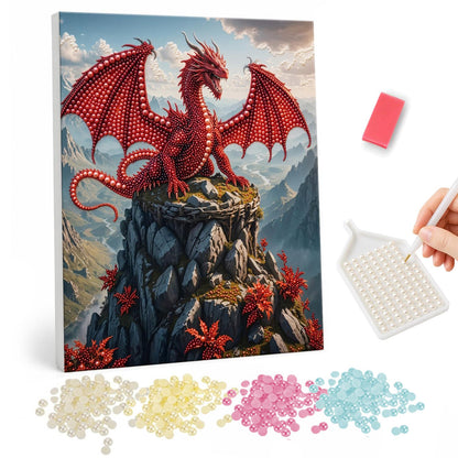 Scarlet Wings Above Misty Peaks pearl painting – Red dragon with wings spread perched on a rocky peak above misty mountains