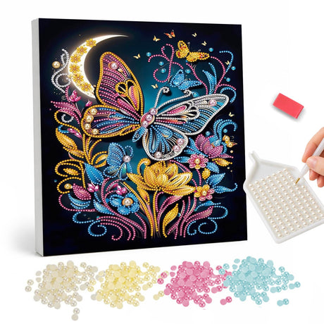 Moonlit Butterfly in Folk Blooms pearl painting – Blue and pink butterfly over golden folk-style flowers with a crescent moon on black