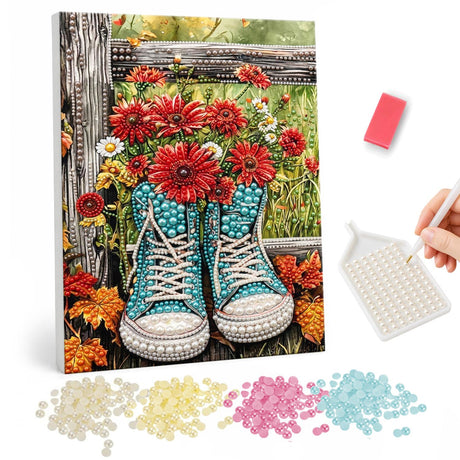 Red Gerberas in Teal Sneakers pearl painting – Pair of turquoise high-top sneakers filled with red gerbera flowers by a wooden garden fence