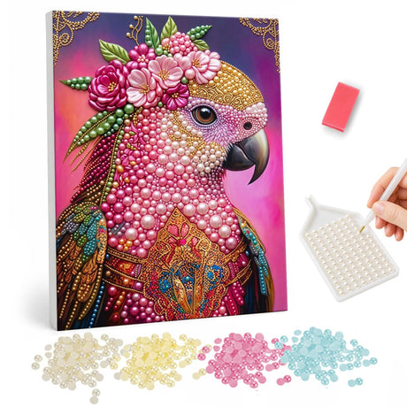 Rosy Parrot in a Flower Crown pearl painting – Pink parrot wearing a crown of pink roses with gold and red ornamental feathers on magenta