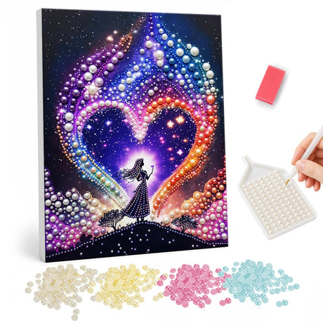 Stargazer in a Galaxy Heart pearl painting – Silhouetted woman on a hilltop beneath a glowing heart of purple and orange lights in a starry sky