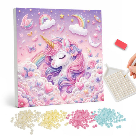 Unicorn Dreaming in the Clouds pearl painting – Sleepy white unicorn with a pink and lilac mane resting in pastel clouds with rainbows and hearts
