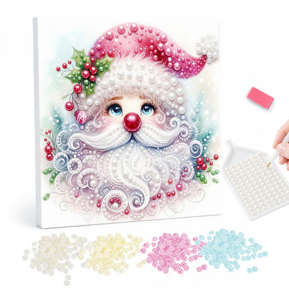 Pink Swirl-Bearded Santa Face pearl painting – Santa face with a pink hat, holly sprig, red nose and swirling white beard on a pastel background