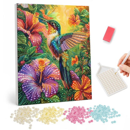 Hummingbird and Purple Hibiscus pearl painting – Iridescent hummingbird hovering among purple, orange and red hibiscus in lush green leaves
