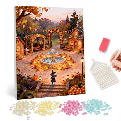 Fountain Courtyard at Dusk pearl painting – Village courtyard with a stone fountain ringed by glowing jack-o'-lanterns, bunting and a small witch at dusk