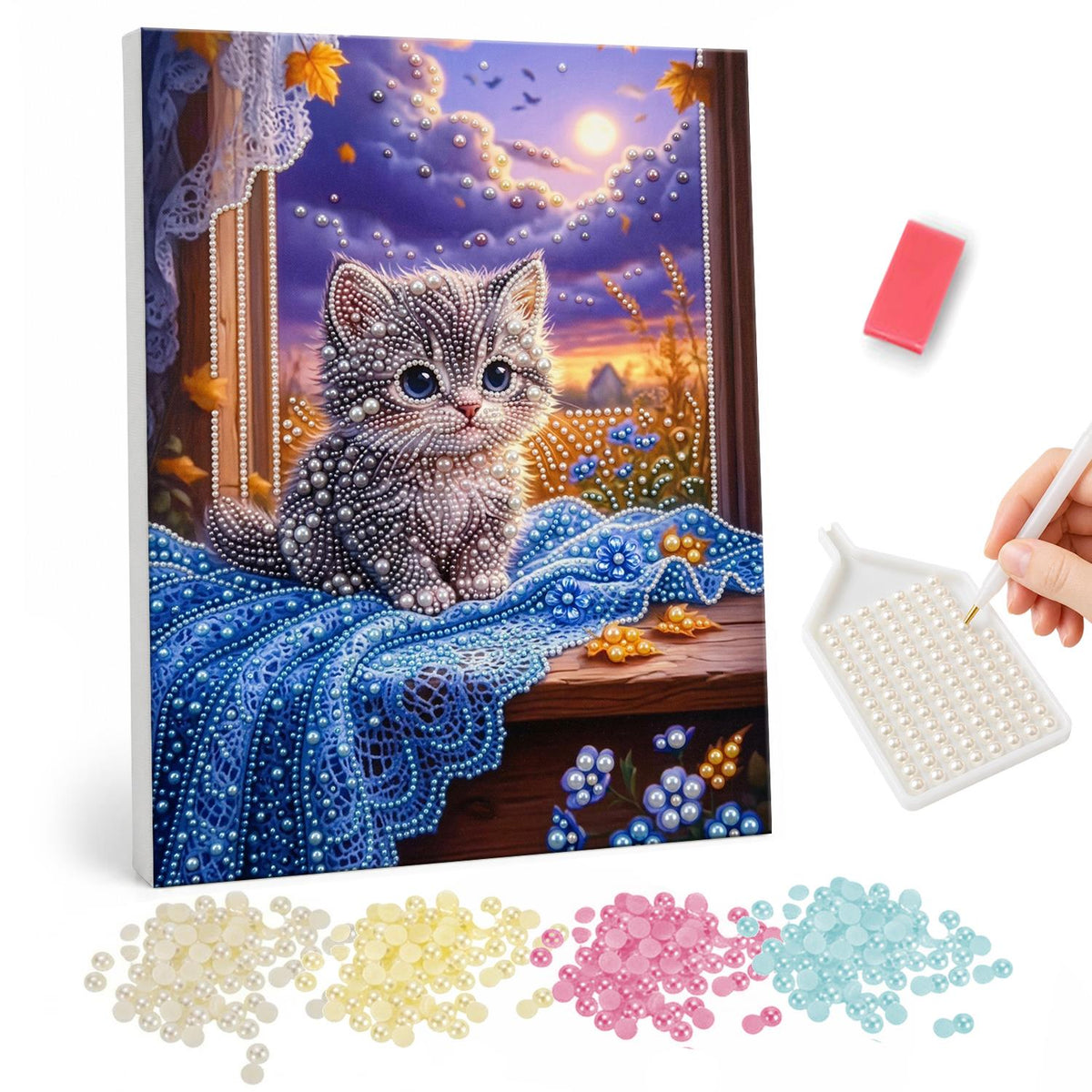 Gray Kitten on a Moonlit Sill pearl painting – Fluffy gray tabby kitten sitting on blue lace by a window with a glowing moon and purple sky