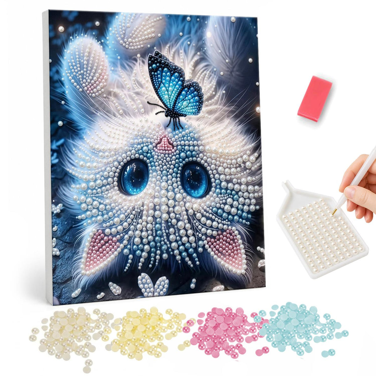 Butterfly-Topped Fluffy Kitten pearl painting – Fluffy white kitten with huge blue eyes and a blue butterfly perched on its head, on dark blue