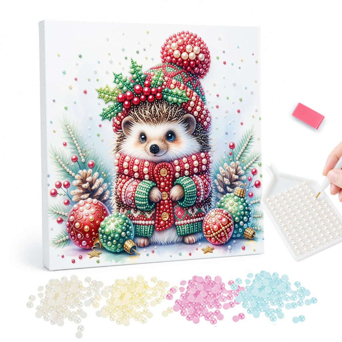 Hedgehog in a Holly Bobble Hat pearl painting – Hedgehog in a red bobble hat with holly and a red knit sweater among baubles and pine cones