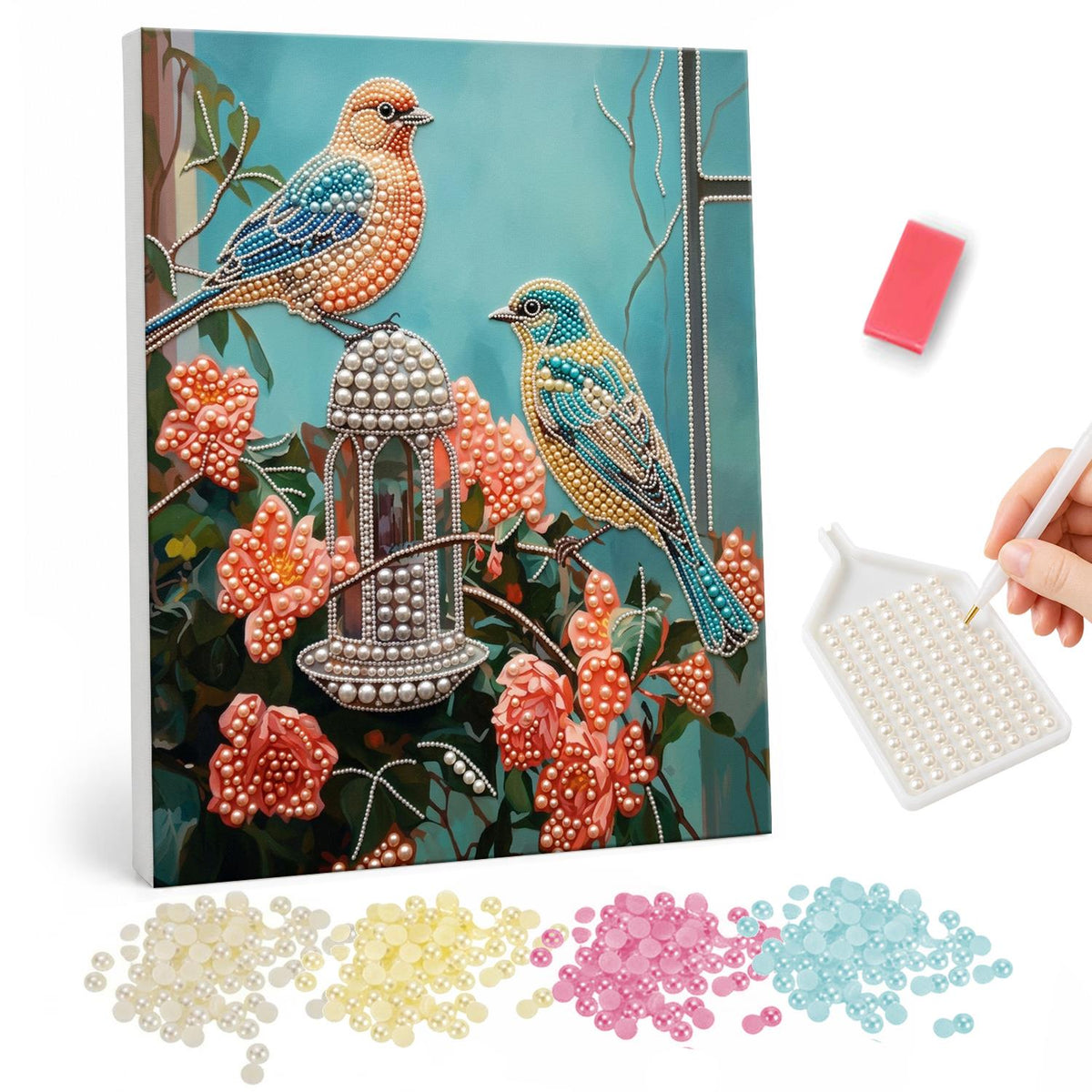 Songbirds at the Rose Feeder pearl painting – Two songbirds, one orange and one yellow-blue, perched on a lantern-shaped feeder among coral roses on teal