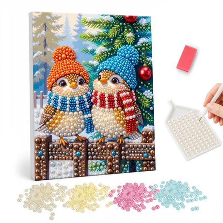 Bobble-Hat Birds on a Fence pearl painting – Two plump songbirds in orange and blue knit hats and striped scarves on a wooden fence by a pine