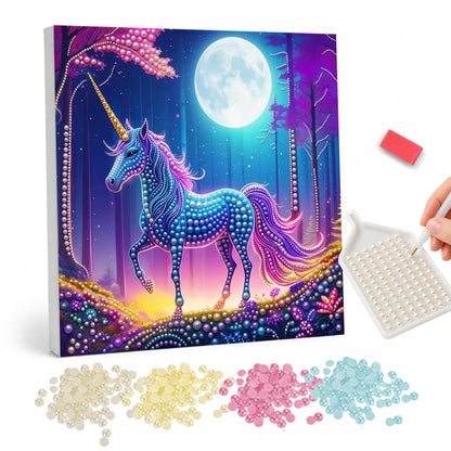 Unicorn in the Violet Forest pearl painting – Blue unicorn with a pink mane walking through a purple forest under a bright full moon