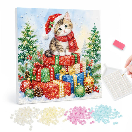Kitten Atop a Pile of Presents pearl painting – Tabby kitten in a Santa hat and red scarf sitting on a stack of wrapped gifts between Christmas trees