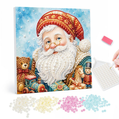 Santa with Spectacles and Toys pearl painting – Santa in round glasses and a red knit hat surrounded by a teddy, toy train, rocking horse and nutcracker