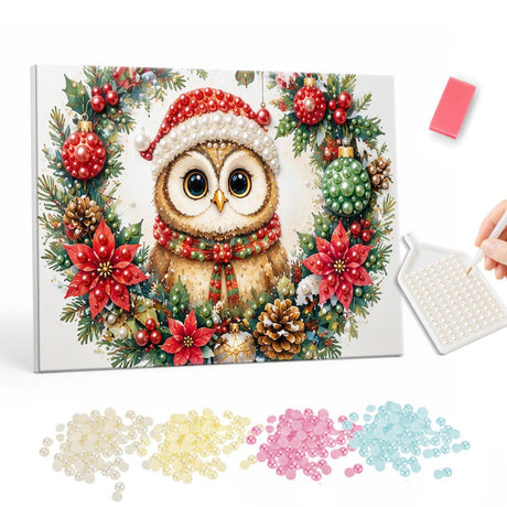 Owl in a Poinsettia Wreath pearl painting – Owl in a Santa hat framed by a wreath of poinsettias, baubles and pine cones