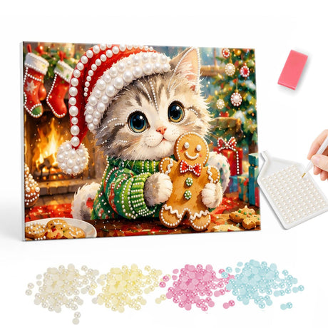 Fireside Gingerbread Kitten pearl painting – Tabby kitten in a Santa hat and green sweater holding a gingerbread man by a fireplace with stockings