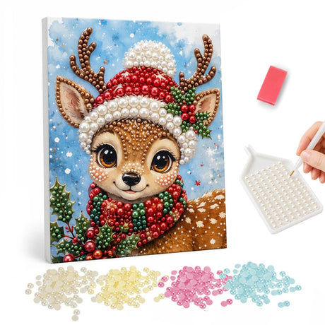Knit-Hat Fawn with Big Eyes pearl painting – Close-up of a big-eyed antlered fawn in a red knit hat with holly and a red and green scarf